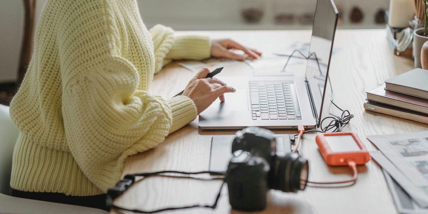 An external hard disk drive plugged into a laptop